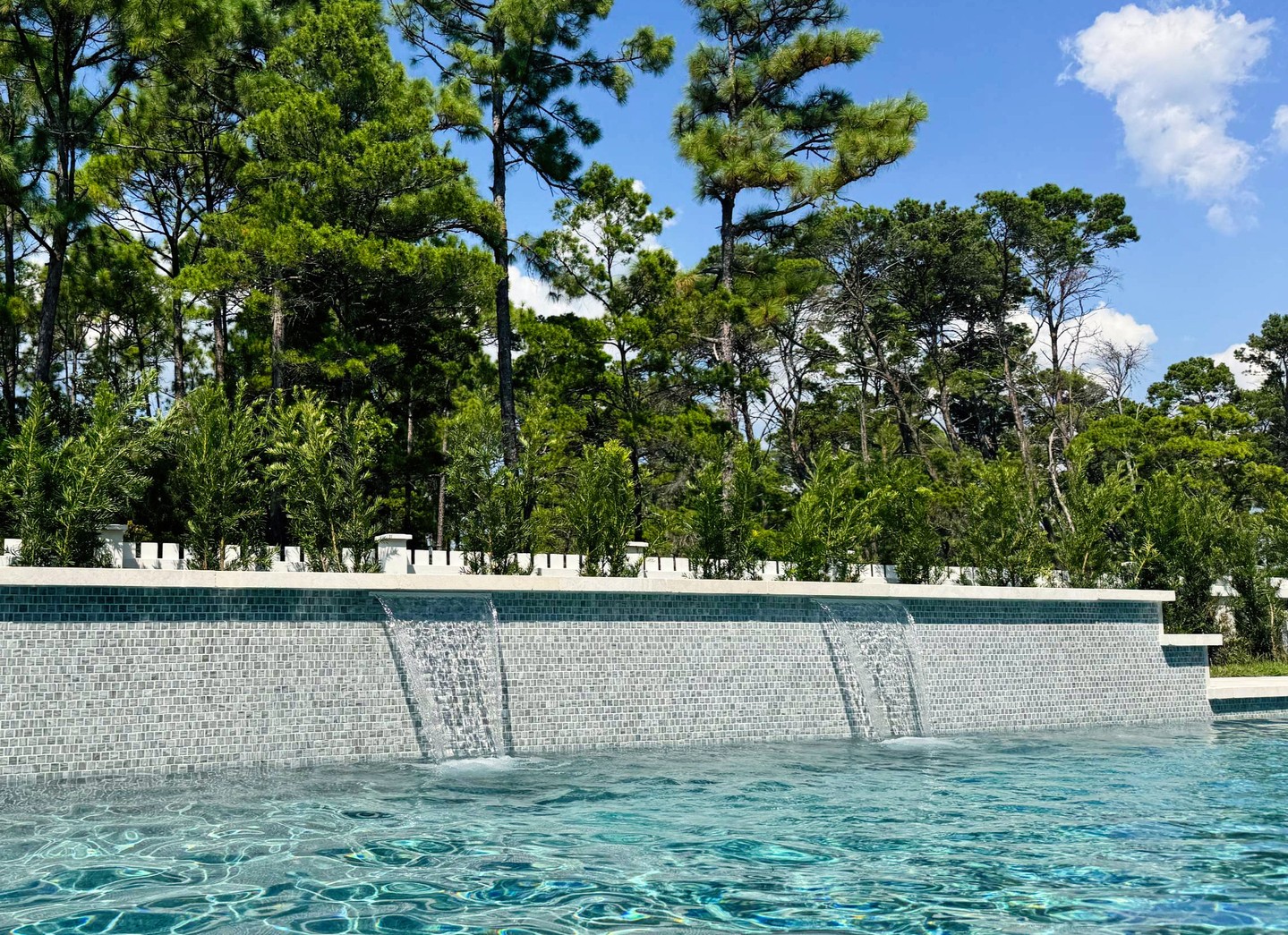 Luxury living meets everyday comfort. This private pool at one of our spec homes in Watersound Origins® is the perfect retreat for relaxing, entertaining, or enjoying the Florida sunshine.  With multiple homes under construction and move-in ready, Huff Homes brings quality craftsmanship to one of South Walton’s most desirable communities.  #HuffHomes #WatersoundOrigins